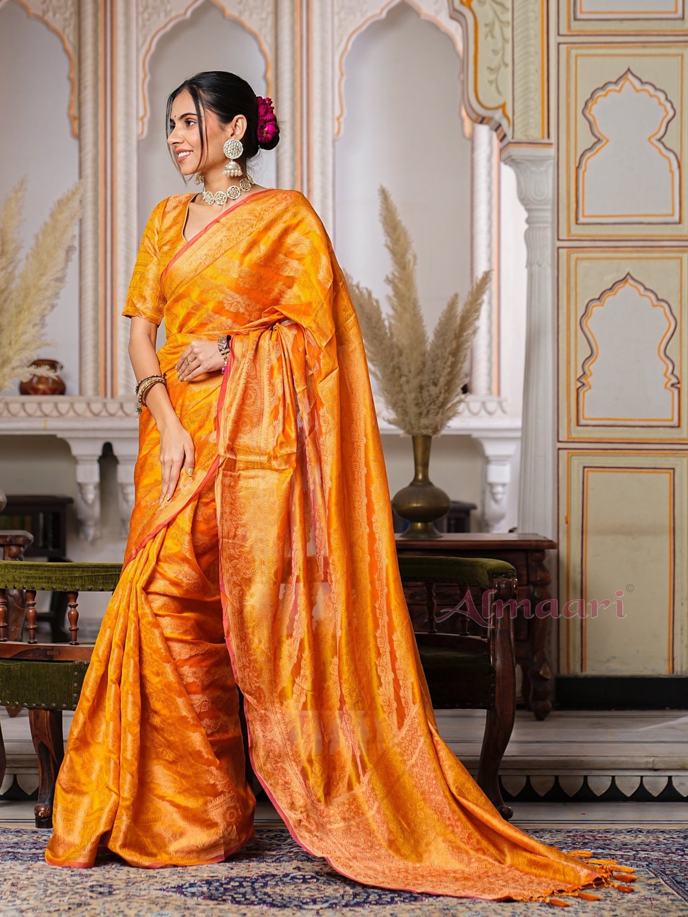 Yellow Color Pure Organza Saree Adorned with Zari Weaving, Complete with Matching Blouse Piece - Almaari Fashion