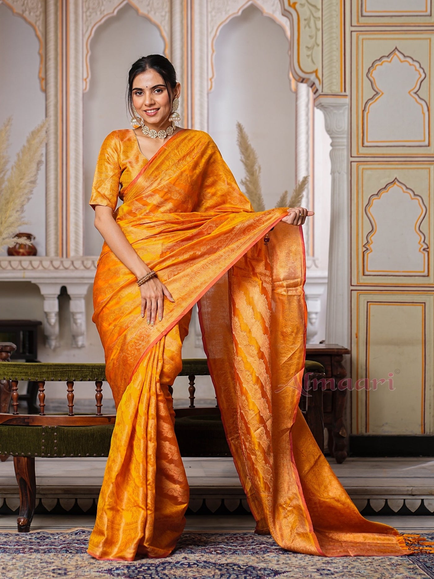 Yellow Color Pure Organza Saree Adorned with Zari Weaving, Complete with Matching Blouse Piece - Almaari Fashion